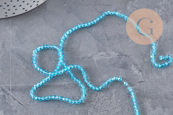 Perles cristal toupies à facette bleu transparent 3-3.3mm, x1 fil de 38cm (G11112)