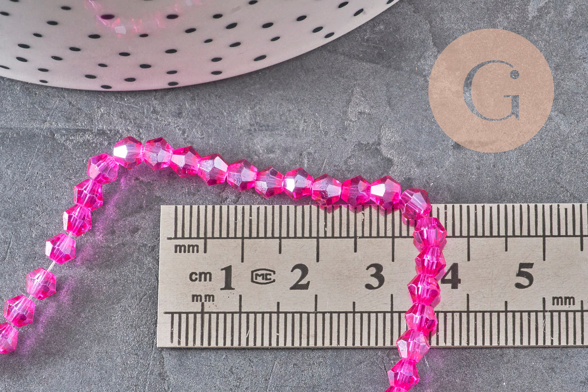 Perles toupies cristal à facette rose fuchsia irisé 4.5mm, x1 fil de 28cm-Perles-Gingerlily Perles