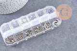 Boite Kit mix de 12 types de fournitures pour bijoux en acier inoxdable doré ou platine, x1 (G10142/G10143)