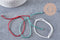 Bracelet réglable cordon polyester blanc vert rouge 1-17cm, x1 (G10828)