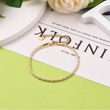 Bracelet tressé coton jaune bleu acier doré 14k 20.5cm, x1 (G6221)