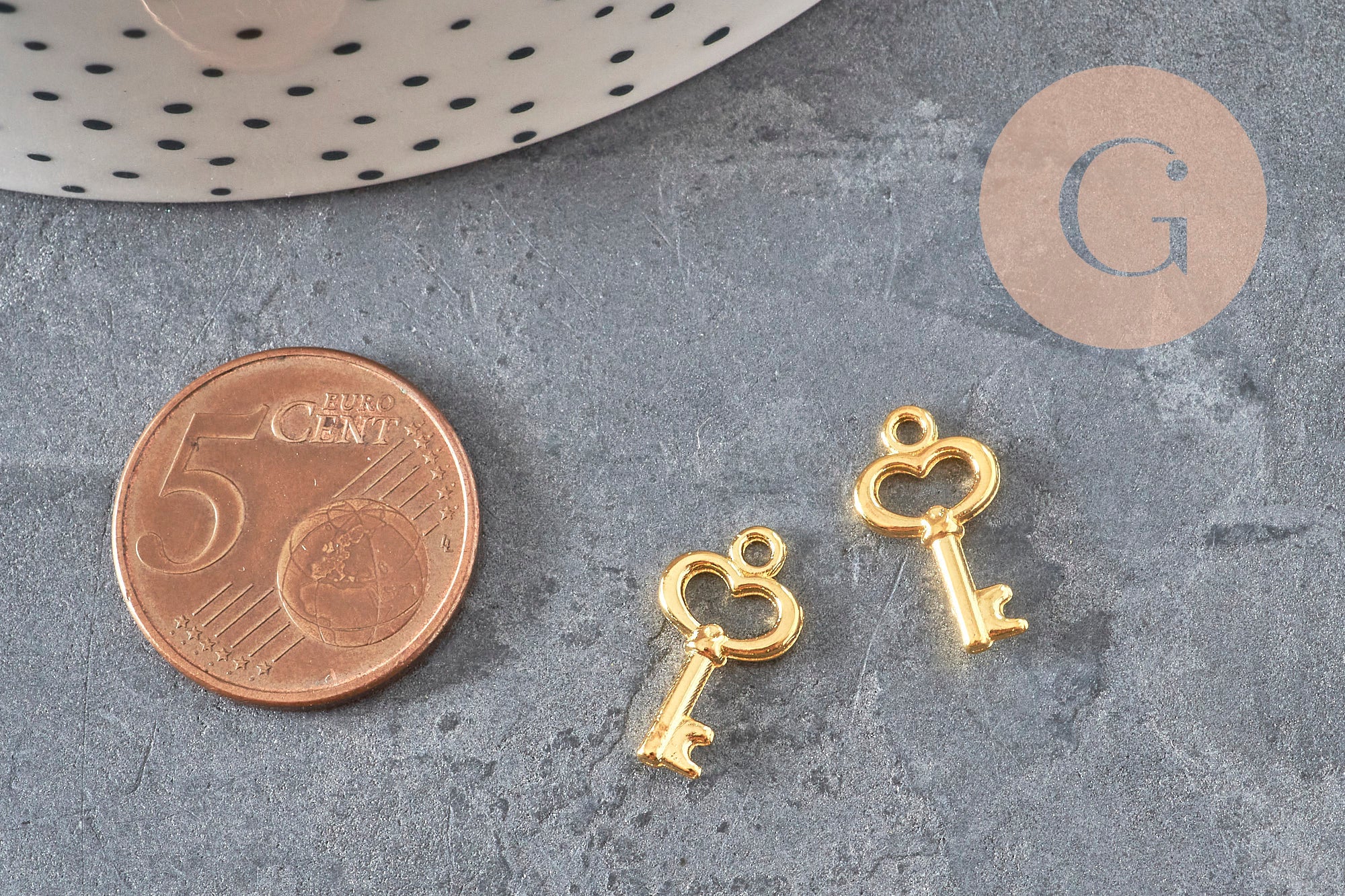 Breloque clef zamac doré15.5mm, x10 (G11227)