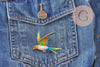 Broche oiseau zamac doré émail 52mm, x1 (G10163)