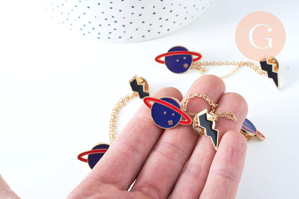 Broche pins double planète éclair doré émail ,broche dorée ,décoration veste,x1 G6381