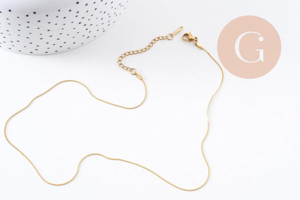 Chaine plate torsadée acier inoxydable doré avec fermoir 0.9mm/45cm, x1 (G10264)