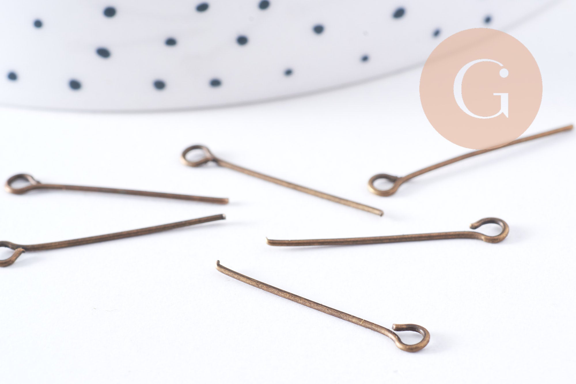 Clou tige tête boucle fer bronze 24mm, x10Gr (G10660)