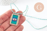 Collier médaille Oeil bleu zircon zamac doré 45cm x1 (G9570)