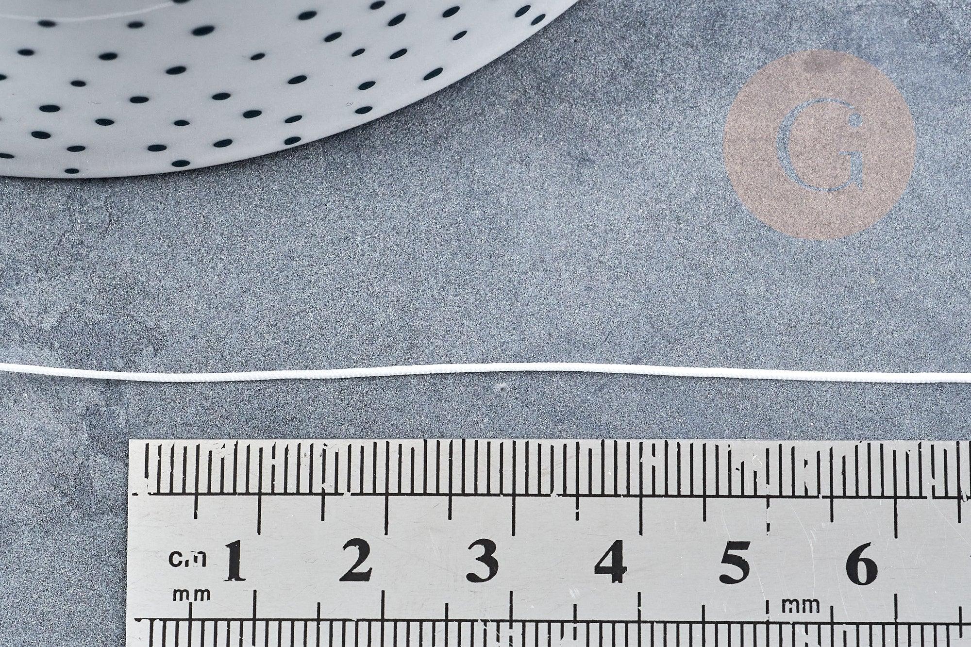 Cordon blanc tressé polyester 0.6mm, x1 mètre (G8450)