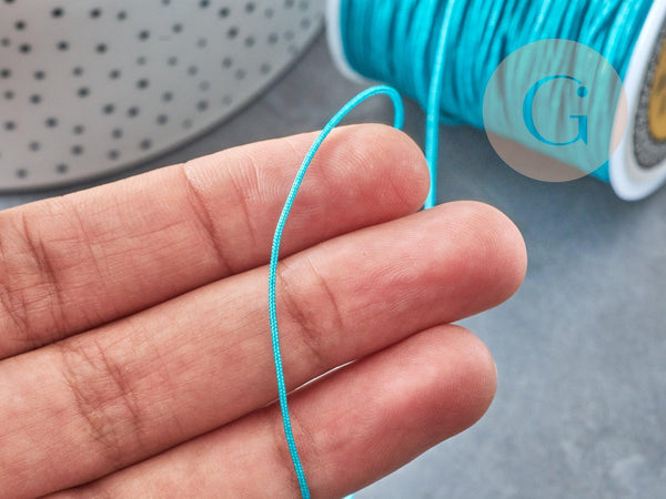 Cordon bleu turquoise tressé polyester 0.8mm, x1 mètre (G3796)