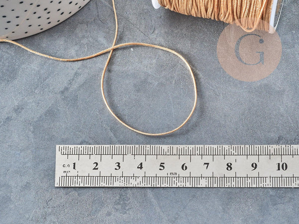 Cordon doré clair tressé polyester 0.8mm, x1 mètre (G5706)