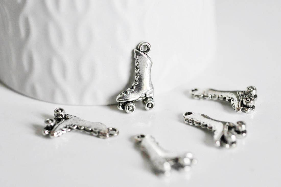 EP Breloques roller argent tibétain,fournitures créatives,argent tibétain,patin à roulettes, breloque argent, création bijoux, x 5,G2403