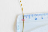 EP Fil nylon 2m métallique acier doré 0,6mm G3791