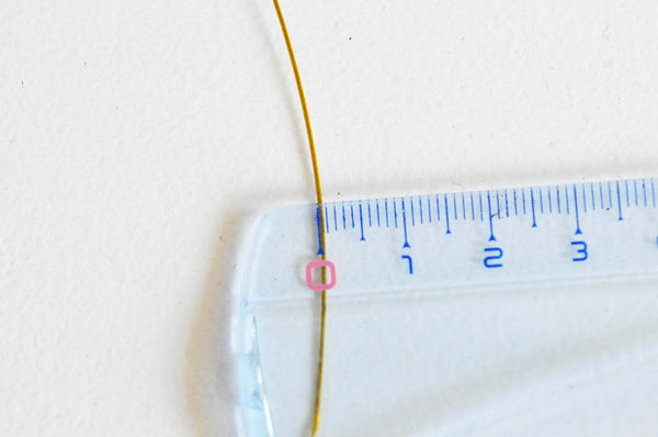 EP Fil nylon 2m métallique acier doré 0,6mm G3791