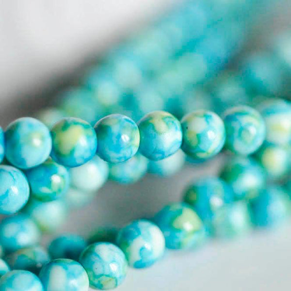 EP Perle jade océan naturel bleue 4mm, x1 fil (G1644)