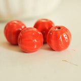 EP Perle porcelaine rouge 13mm striées x5 G0703