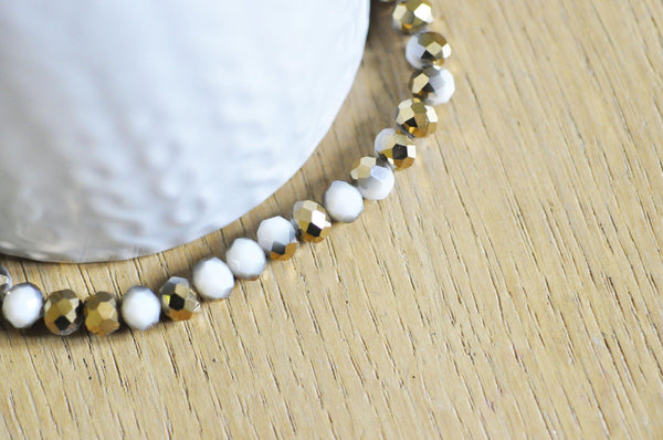 EP-Perles toupies cristal blanc doré 6x5mm x1 fil de 90, G4693