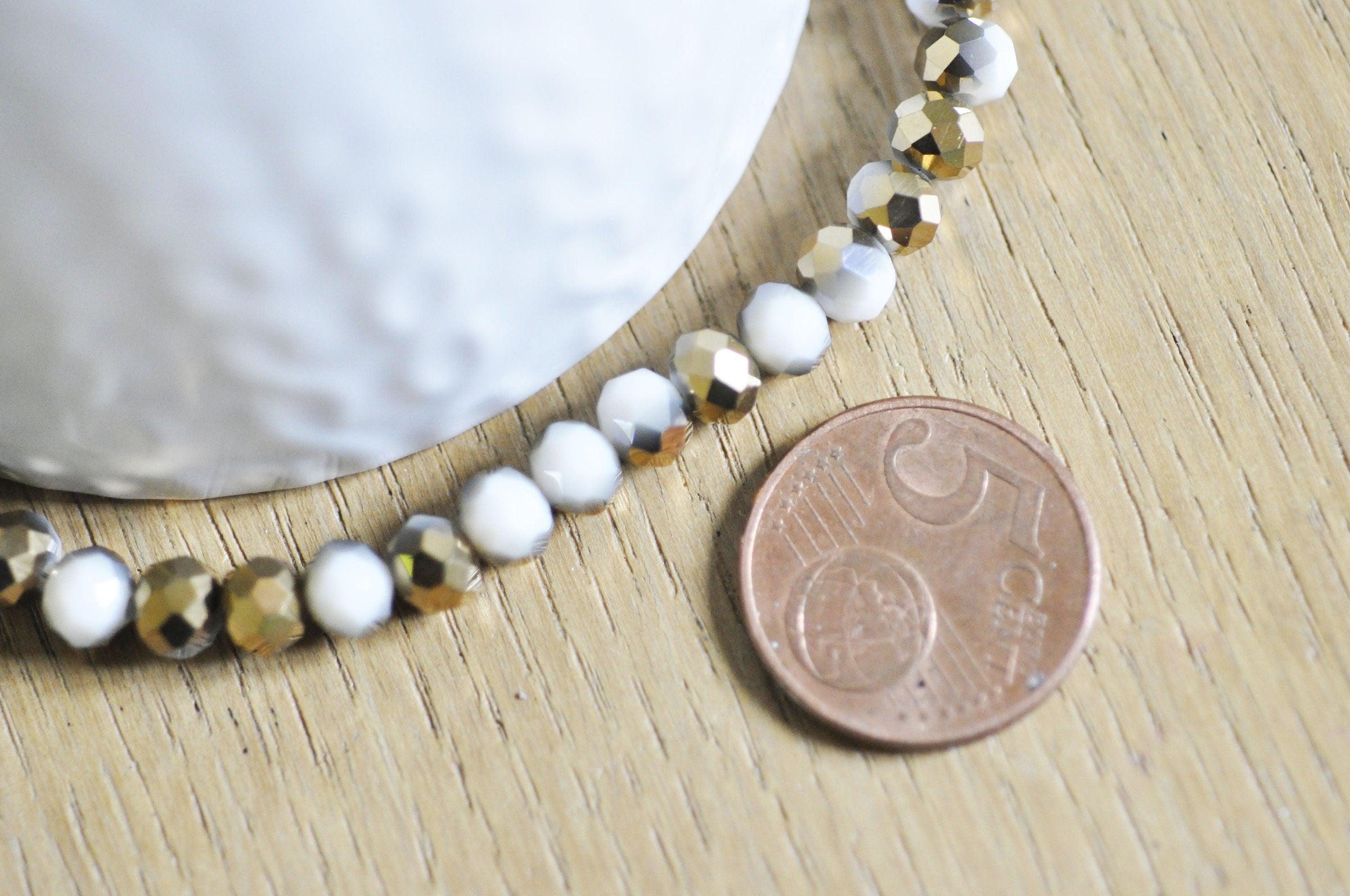 EP-Perles toupies cristal blanc doré 6x5mm x1 fil de 90, G4693