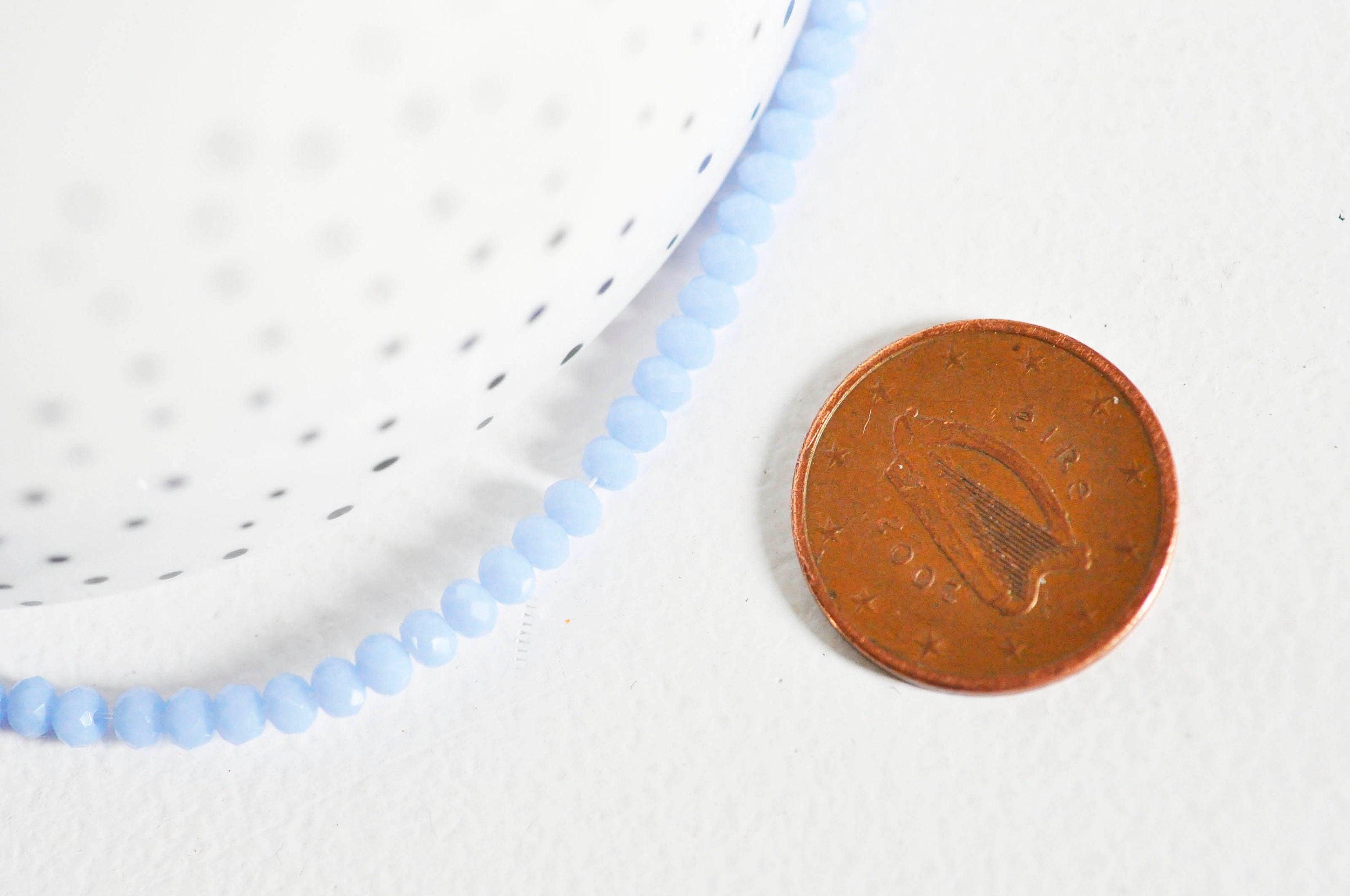 EP Perles toupies cristal bleu lavande, x1 fil de 135, 3x2mm G3607