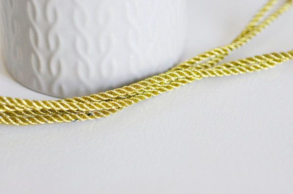 EP -cordon satiné dore 2-3mm, x 1 mètre-G1708