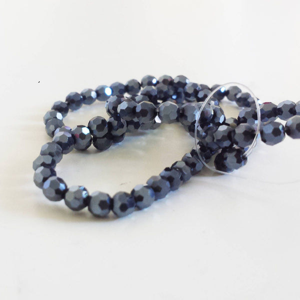 EP x 20 perles à facette noir irisé opaque en verre