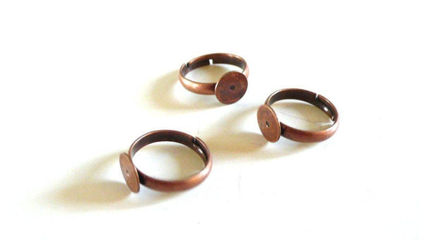 EP x 4 supports de bague réglables couleur Cuivre - petite taille