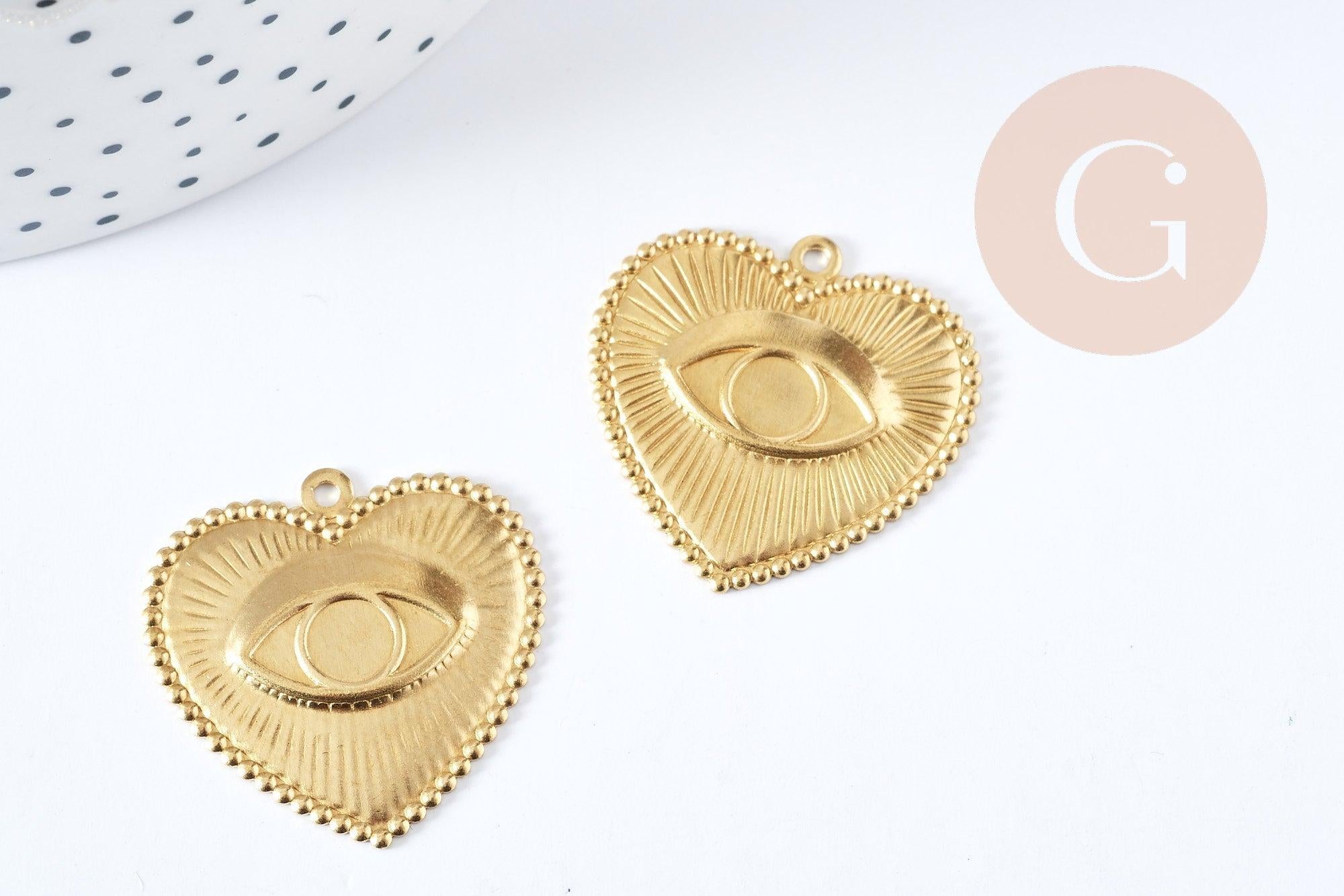 Pendentif médaille coeur oeil protecteur laiton brut 28mm, un apprêt doré sans nickel,une médaille dorée en laiton brut, x1 G6317