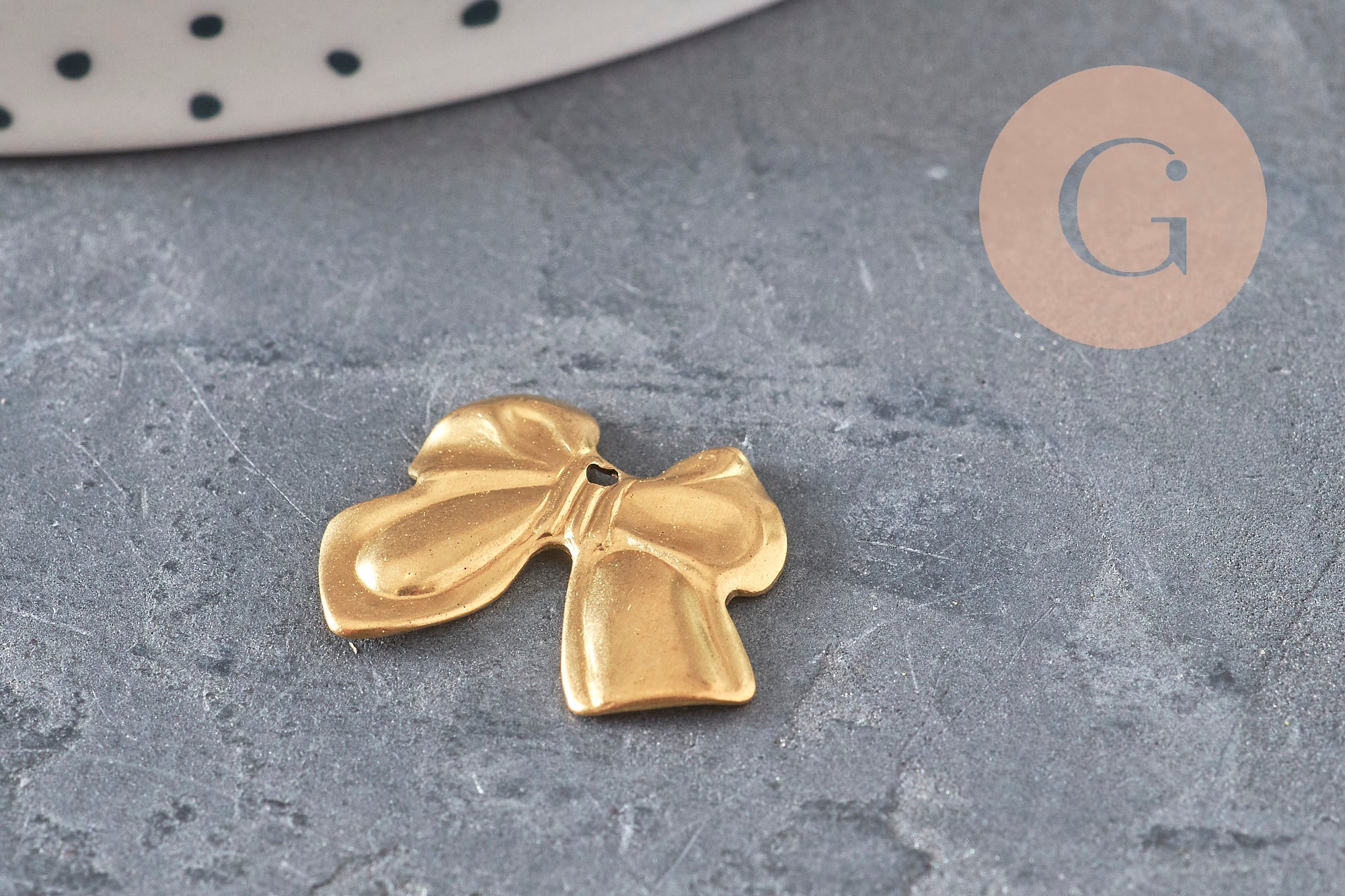 Pendentif noeud papillon laiton brut 17mm, x1 (G10167)