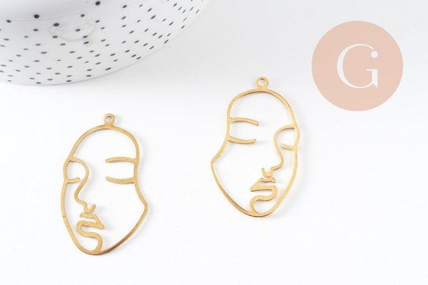 Pendentif visage laiton brut, fournitures pour bijoux, laiton brut ,bijoux moderne,43x26mm, x1, G3183