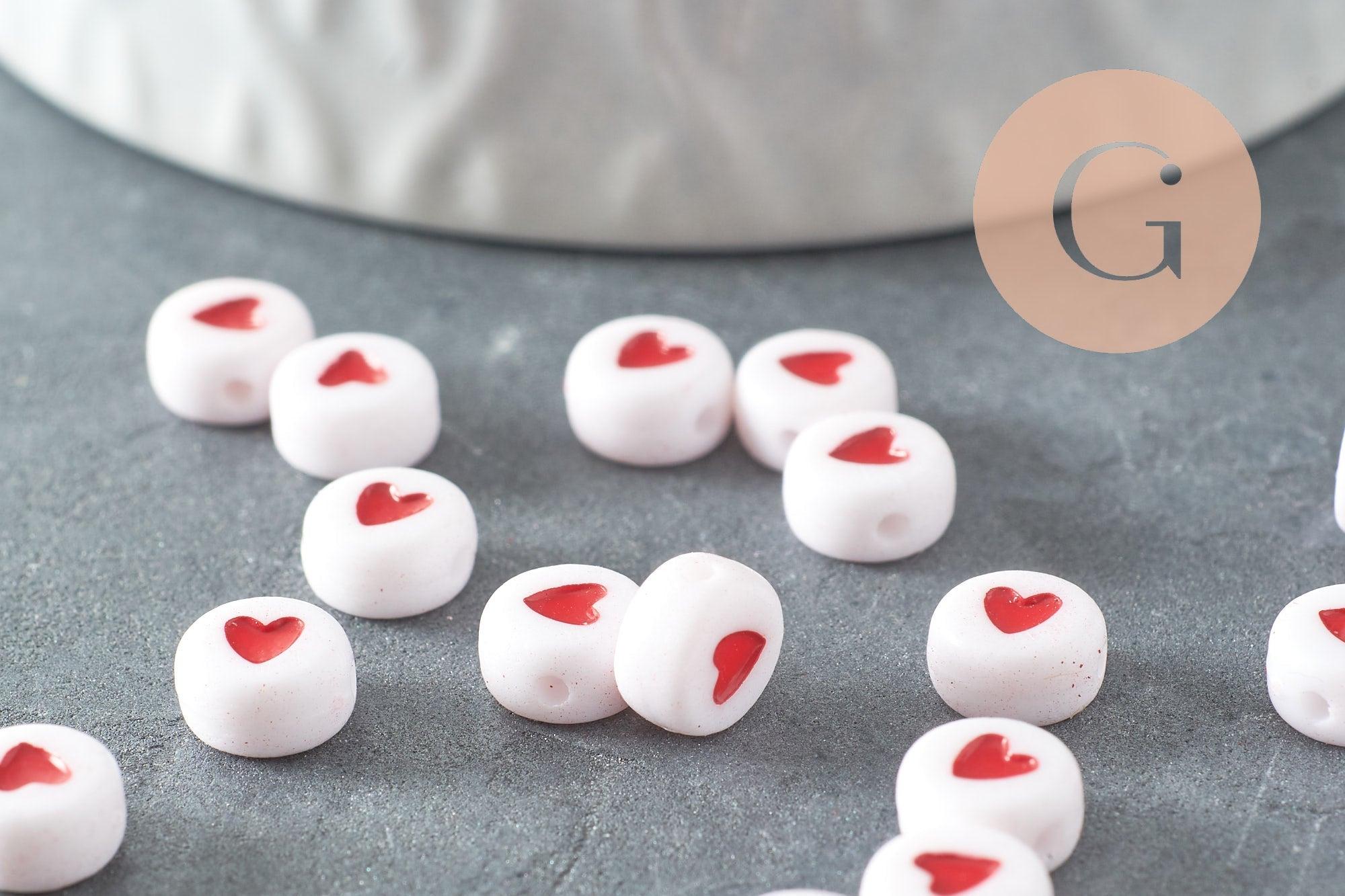 Perle disque coeur rouge plastique blanc 7mm, x10 grammes (G1786)