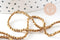 Perle ronde facetté hématite dorée 2mm, x1 fil 39.8cm (G4428)