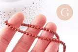 Perle ronde jaspe rouge naturel facetté 4mm, x1 fil de 37cm (G1173)
