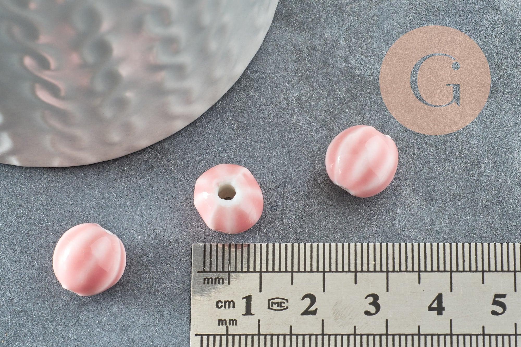 Perle ronde striée porcelaine rose 11mm, x10 (G9528)