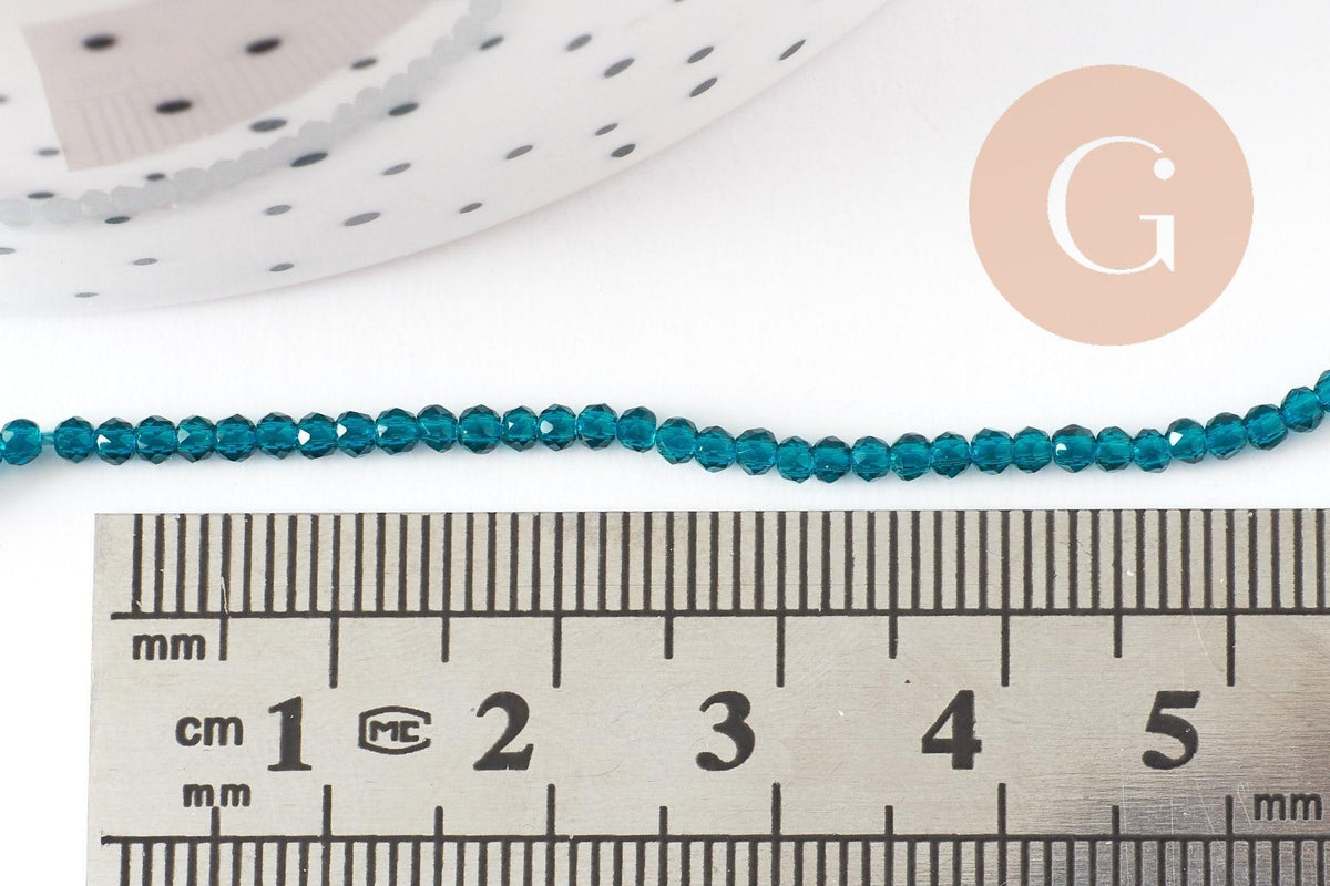 Perle ronde verre facettée transparente bleu turquoise 2mm, x1 fil de 37 cm (G7447)