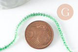 Perle ronde verre facettée transparente vert clair 2mm, x1 fil de 37cm (G7445)