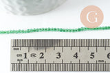 Perle ronde verre facettée transparente vert clair 2mm, x1 fil de 37cm (G7445)