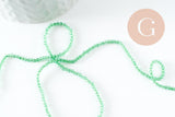 Perle ronde verre facettée transparente vert clair 2mm, x1 fil de 37cm (G7445)