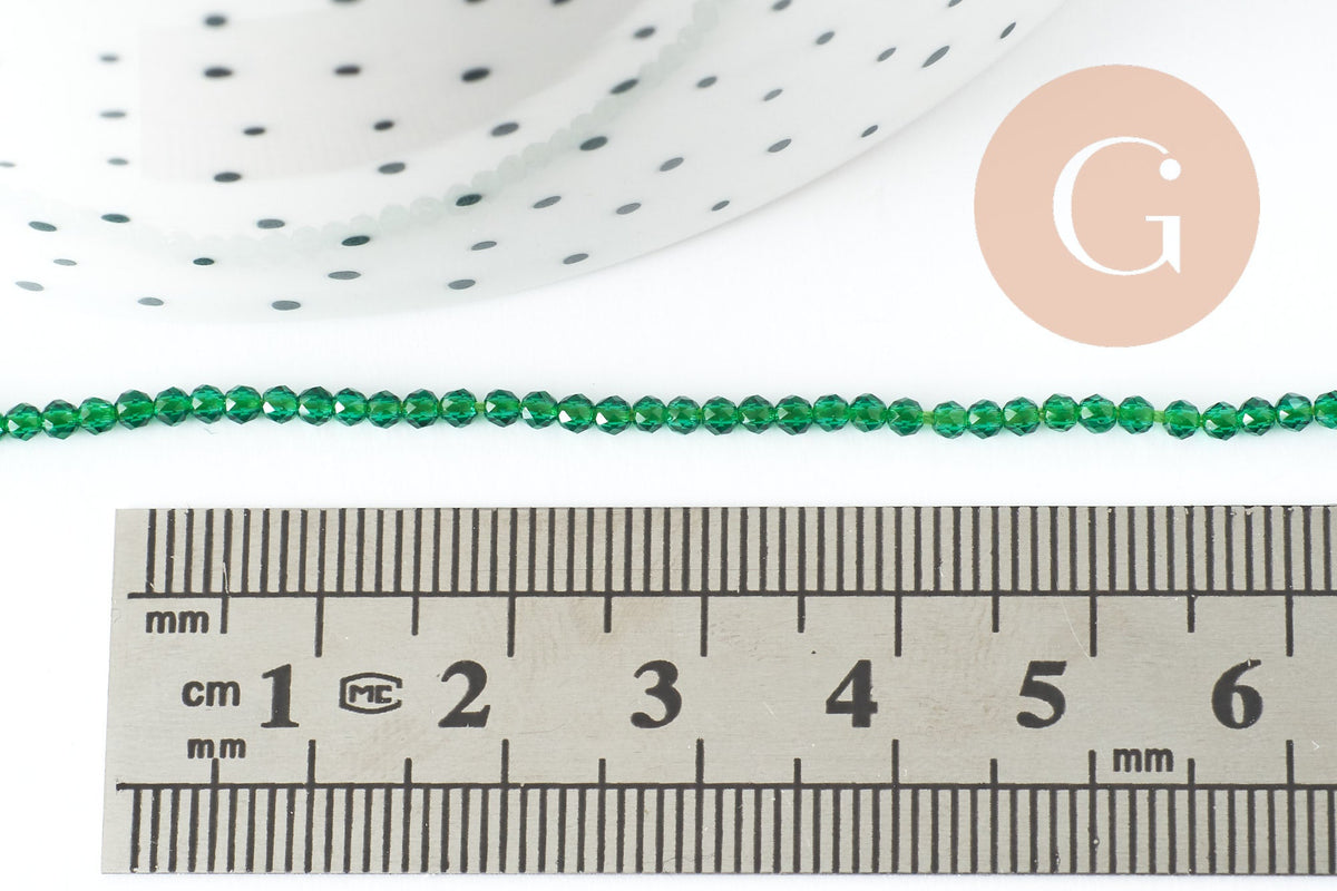 Perle ronde verre facettée transparente vert foncé 2mm, x1 fil de 37cm (G7393)