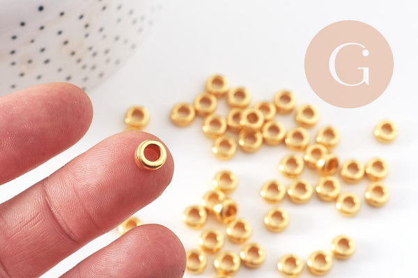 Perles intercalaires rondelles zamac doré 7mm, x50 (G10938)