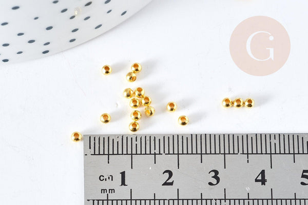 Perles intercalaires rondes laiton doré 2.4mm, x 1Gr (G9841)