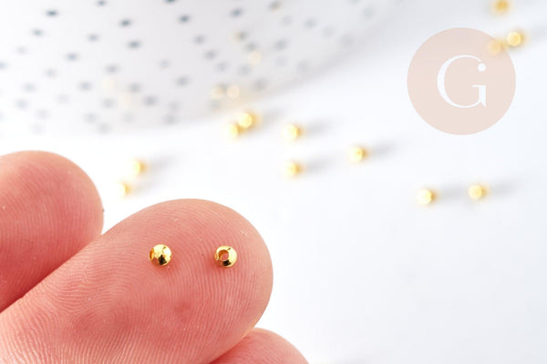 Perles intercalaires rondes laiton doré 2.4mm, x 1Gr (G9841)