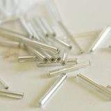 Perles rocaille Tube verre argent métallisé 20mm x 2.5mm, long tube,perle argentées, x 10gr G1163
