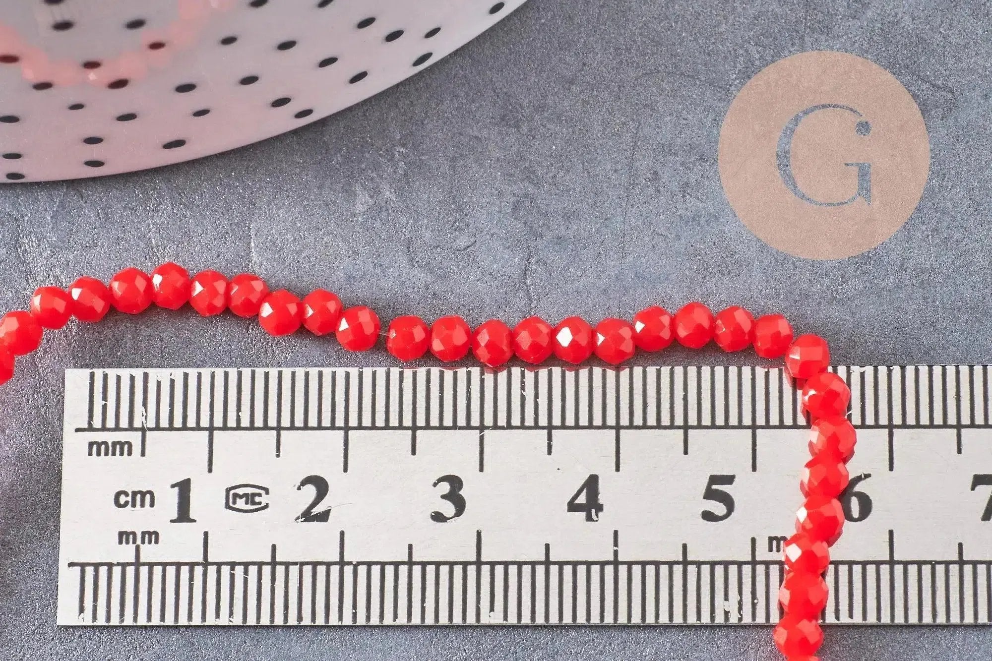 Perles rondelles verre transparente facettées 3.5x2.5mm, x1 fil de 32cm (G8262)