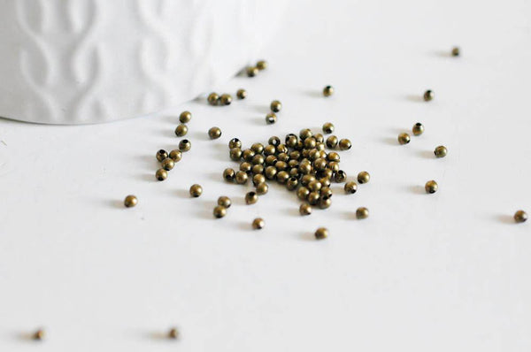 Perles rondes bronze intercalaires 2mm, x10 gr (G5147)