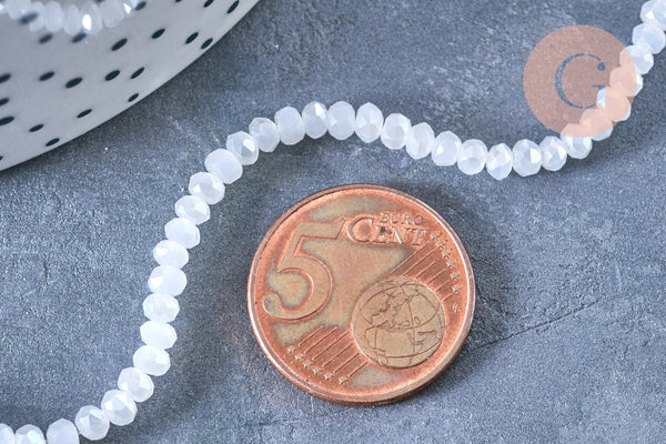 Perles toupies cristal blanc irisé 3.5x2.5mm, fil 25.4cm x1 (G6763)