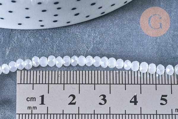 Perles toupies cristal blanc irisé 3.5x2.5mm, fil 25.4cm x1 (G6763)