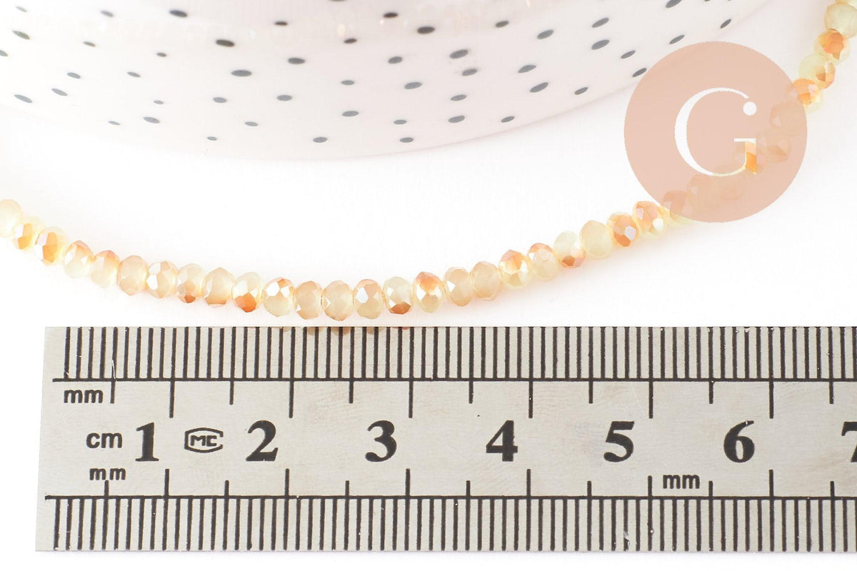 Perles toupies cristal jaune transparent irisé 3.5x2.5mm, x1 fil 38cm (G8593)