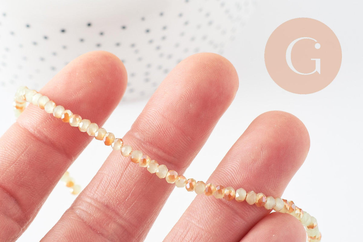 Perles toupies cristal jaune transparent irisé 3.5x2.5mm, x1 fil 38cm (G8593)
