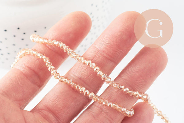 Perles toupies cristal orange transparent irisé 3.5x2.5mm, fil 25cm, x1 (G8595)