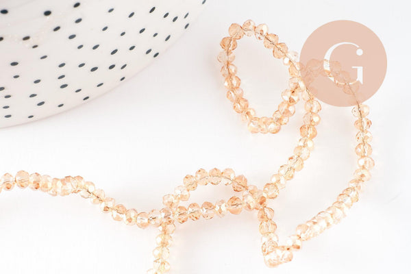 Perles toupies cristal orange transparent irisé 3.5x2.5mm, fil 25cm, x1 (G8595)