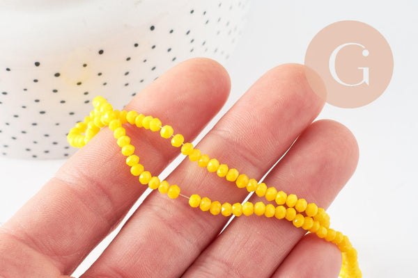 Perles toupies verre jaune facette 3mm, x1 fil de 38cm (G2669)